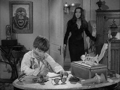 Carolyn Jones and Ken Weatherwax in The Addams Family (1964)