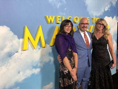 C. Kim Miles with his wife Joanna and daughter Merdeka on the red carpet at the premiere of “Welcome to Marwen”