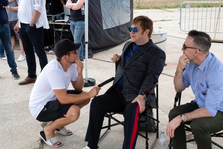 Elton John, David Furnish, and Taron Egerton in Rocketman (2019)