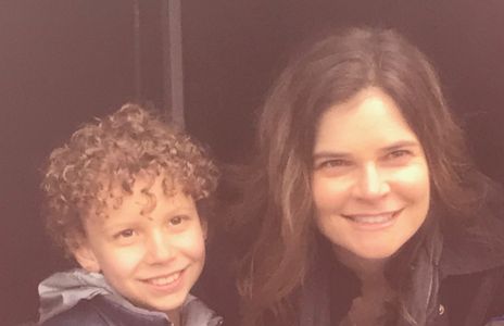 Isaak Bailey and Betsy Brandt on set for Flint.