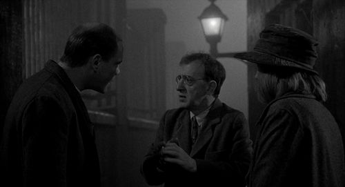 Woody Allen, Mia Farrow, and Daniel von Bargen in Shadows and Fog (1991)