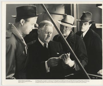 Joseph Crehan, Dennis Morgan, Wayne Morris, and Charles C. Wilson in The Return of Doctor X (1939)