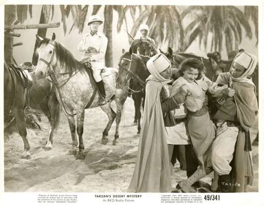 Nancy Kelly and Otto Kruger in Tarzan's Desert Mystery (1943)