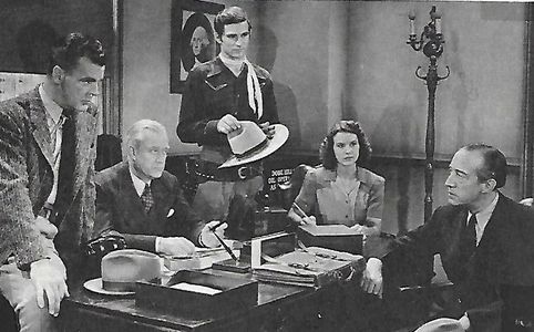 Sammy Baugh, Neil Hamilton, Pauline Moore, and Charles Trowbridge in King of the Texas Rangers (1941)