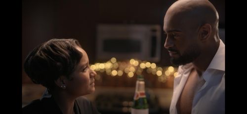 Rhyon Nicole Brown and Sean Poolman in Rolling Into Christmas (2022)