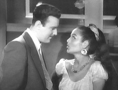 Manolo Fábregas and Sara Montiel in Piel canela (1953)
