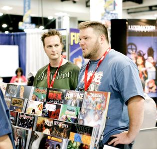 Sean Patrick O'Reilly and Mark Poulton at the Arcana booth at San Diego Comic Con.