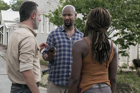 Andrew Lincoln, Danai Gurira, and Kenric Green in The Walking Dead (2010)