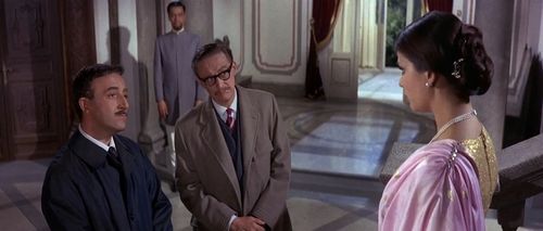 Peter Sellers, Claudia Cardinale, Colin Gordon, and James Lanphier in The Pink Panther (1963)