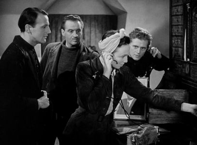 Hugh Burden, Emrys Jones, Eric Portman, and Googie Withers in One of Our Aircraft Is Missing (1942)