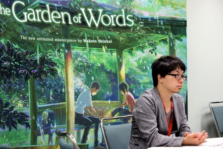 Makoto Shinkai at an event for The Garden of Words (2013)