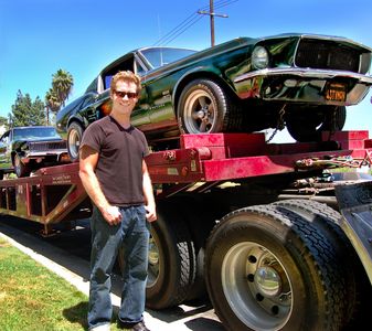 Lee Anthony Smith with '67 Bullitt Mustang replica while filming 