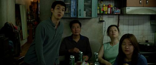Song Kang-ho, Jang Hye-jin, Choi Woo-sik, and Park So-dam in Parasite (2019)