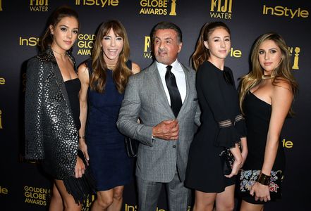 Sylvester Stallone, Jennifer Flavin, Sophia Rose Stallone, Sistine Rose Stallone, and Scarlet Rose Stallone at an event 