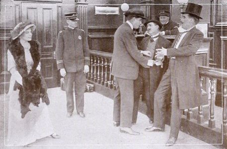 Edward Clisbee, R. Henry Grey, Thomas G. Lingham, and Cleo Ridgely in The Diamond Broker (1915)