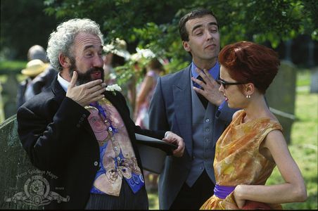 Simon Callow, John Hannah, and Charlotte Coleman in Four Weddings and a Funeral (1994)