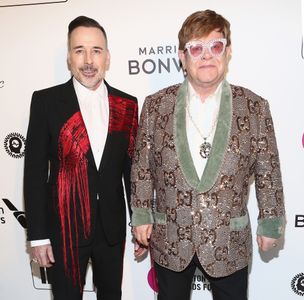 Elton John and David Furnish at an event for IMDb at the Oscars (2017)