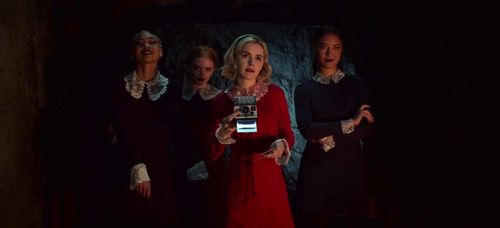 Kiernan Shipka, Tati Gabrielle, Abigail Cowen, and Adeline Rudolph in Chilling Adventures of Sabrina (2018)