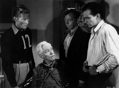 Rudolph Anders, Helmut Dantine, Samuel S. Hinds, and Kurt Kreuger in Escape in the Desert (1945)