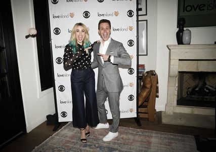 The Narrator of Love Island USA Matthew Hoffman, and Host Arielle Vandenberg arrive at the Love Island Reunion in West H