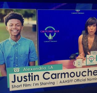 Justin Carmouche being interviewed on TV, discussing is critically acclaimed short film “I’m Starving”