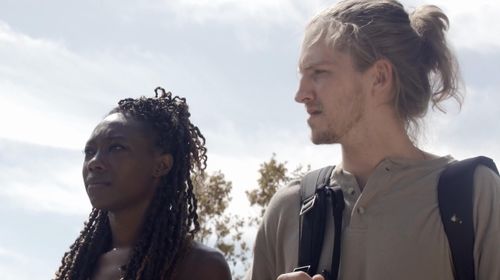 Still of Robin K. Johnson and Ashton Glover in horror film 