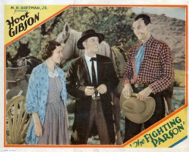 Marceline Day, Hoot Gibson, and Skeeter Bill Robbins in The Fighting Parson (1933)
