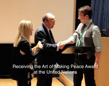 Receiving The Art of Making Peace Award from Ambassador Anruwal Chowdhury at the United Nations 2014. Matthew received t