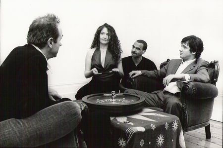 Hugh Cornwell, Ben Thomas, Ras Barker, and Annette Ross in Somewhere (2005)