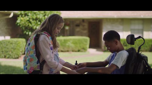 Paul-Mikél Williams and Austyn Johnson in The Girl Who Believes in Miracles (2021)