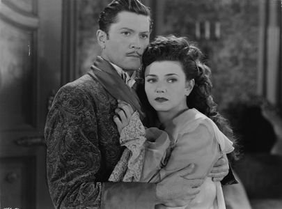 Lenore Aubert and Carl Esmond in The Catman of Paris (1946)