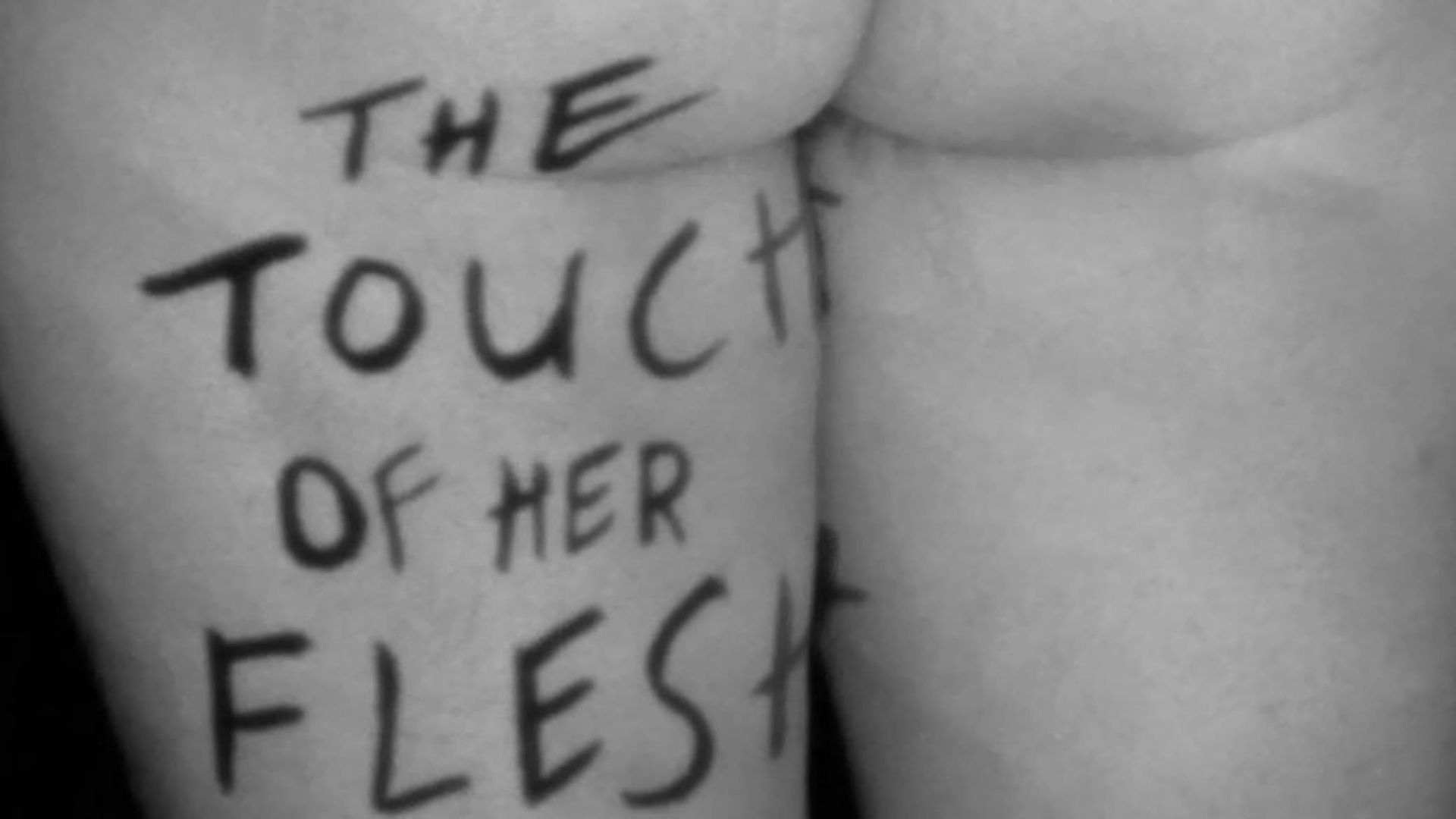 The Touch of Her Flesh background