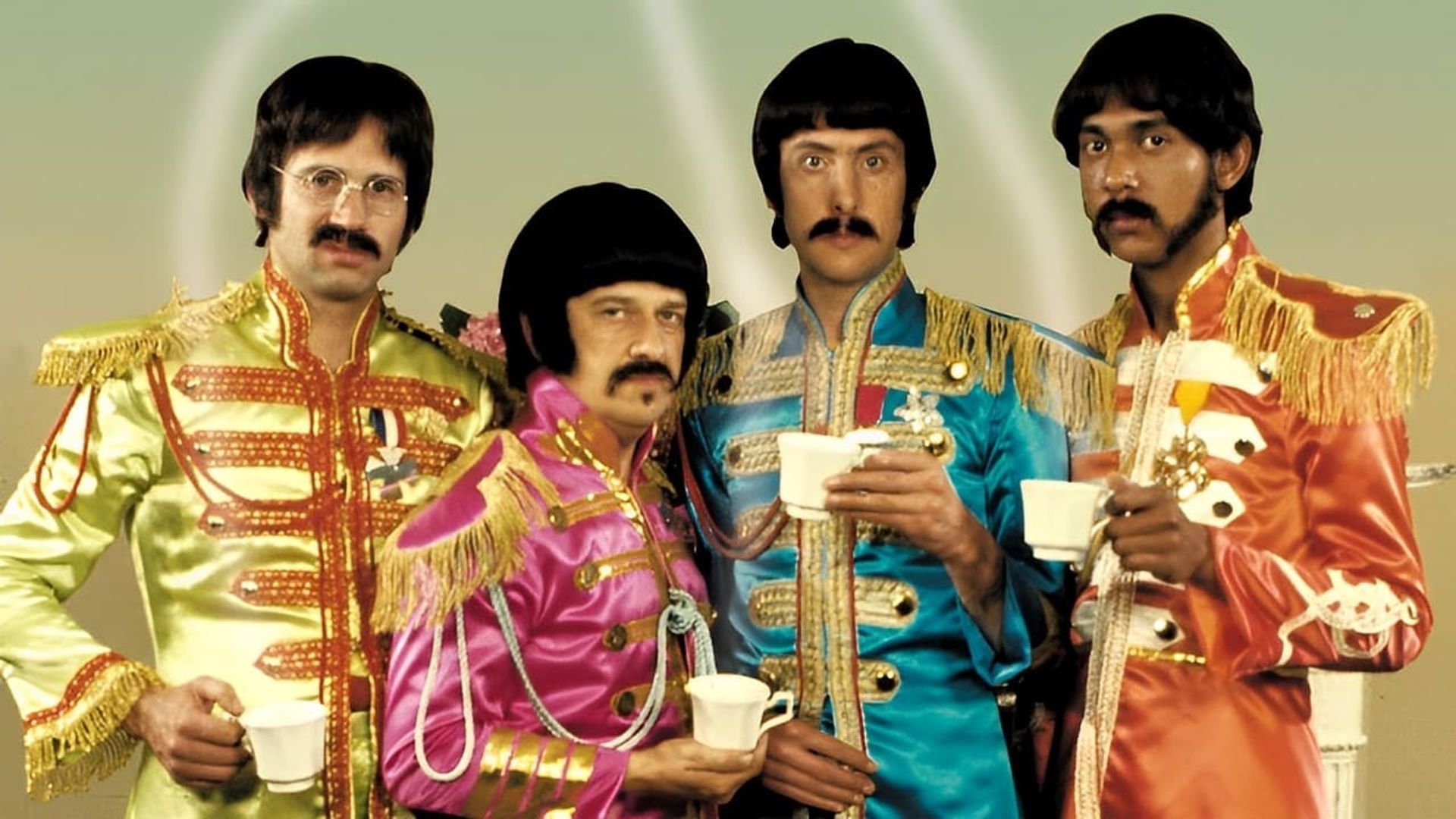 The Rutles: All You Need Is Cash background