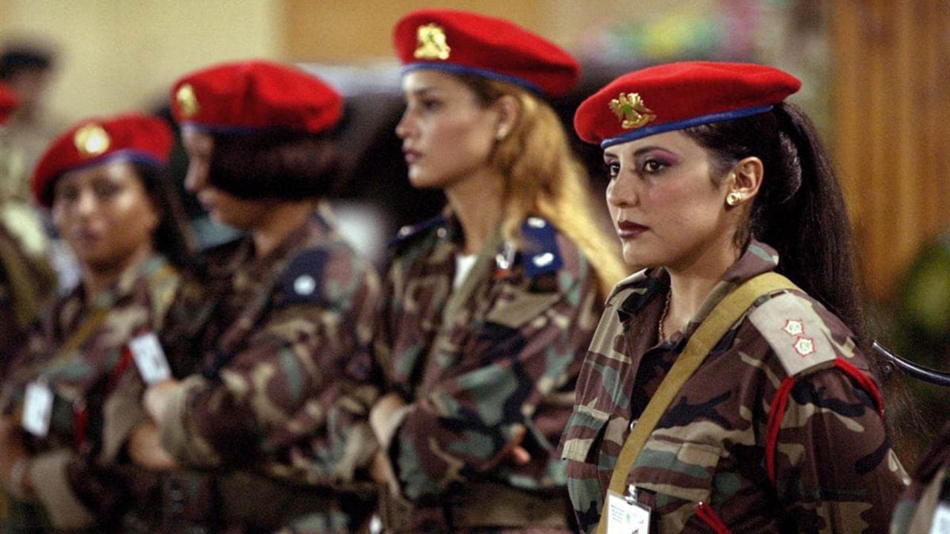 Shadows of a Leader: Qaddafi's Female Bodyguards background
