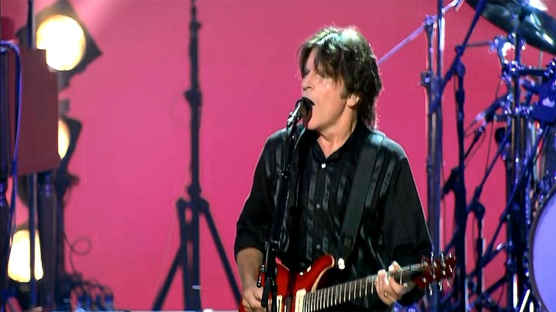 John Fogerty: The Long Road Home in Concert background