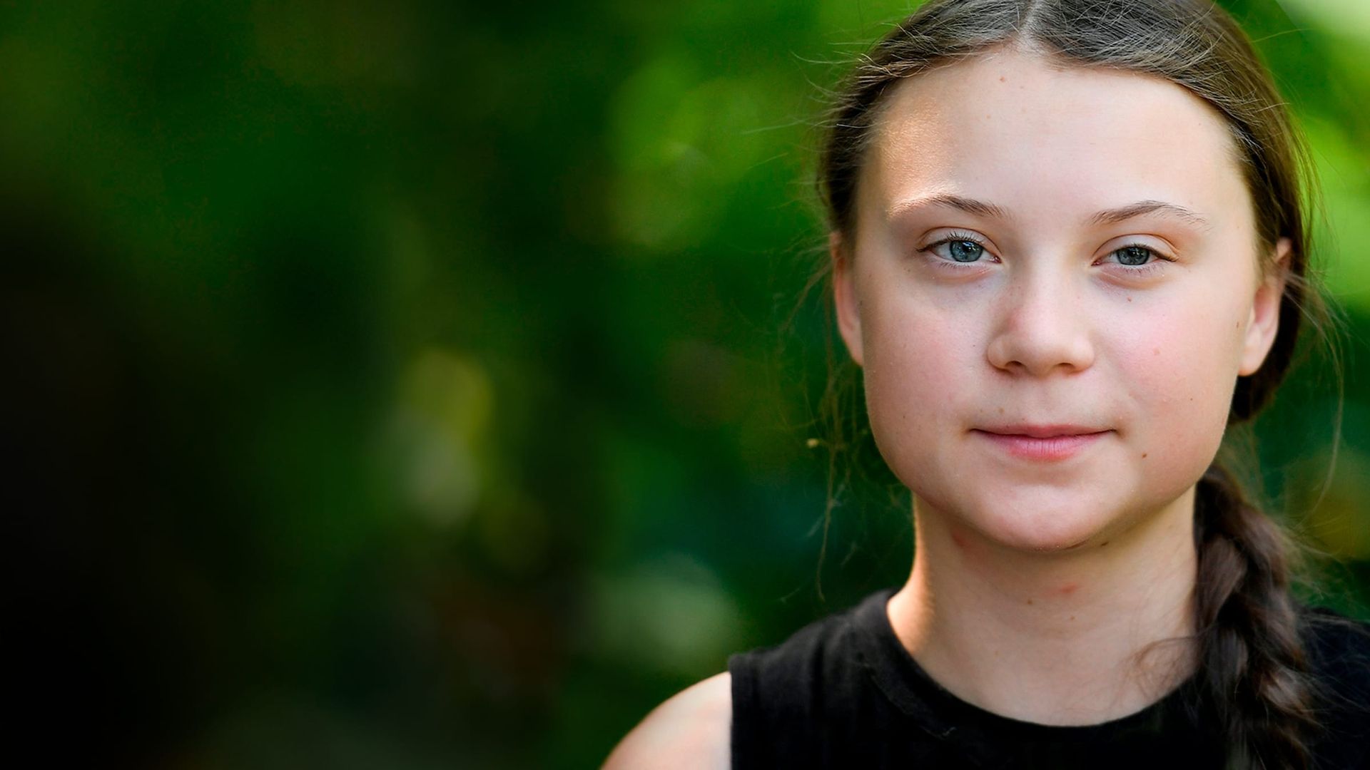 Greta Thunberg: The Voice of the Future background