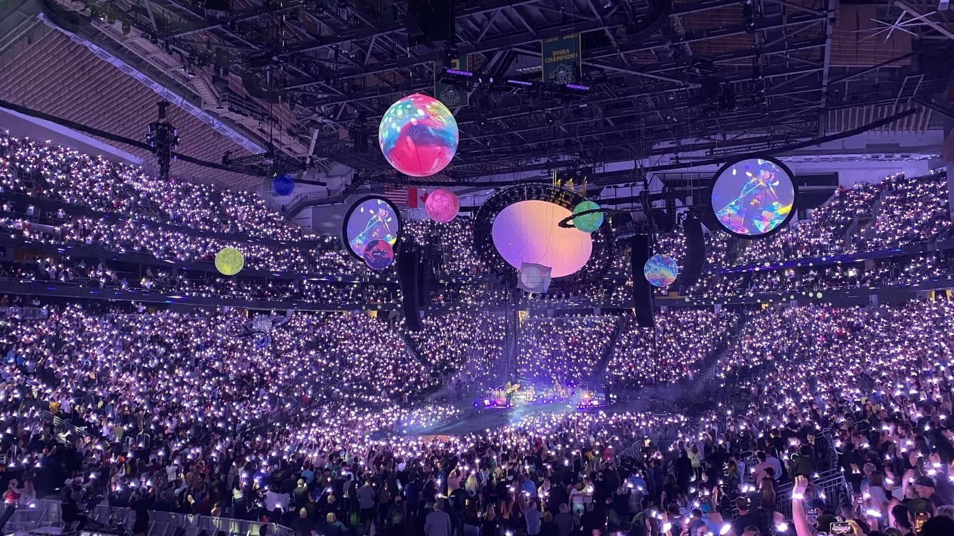 Coldplay Live from Climate Pledge Arena background