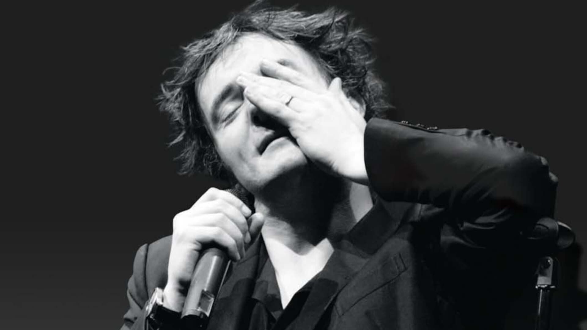 Aim Low: The Very Best of Dylan Moran background