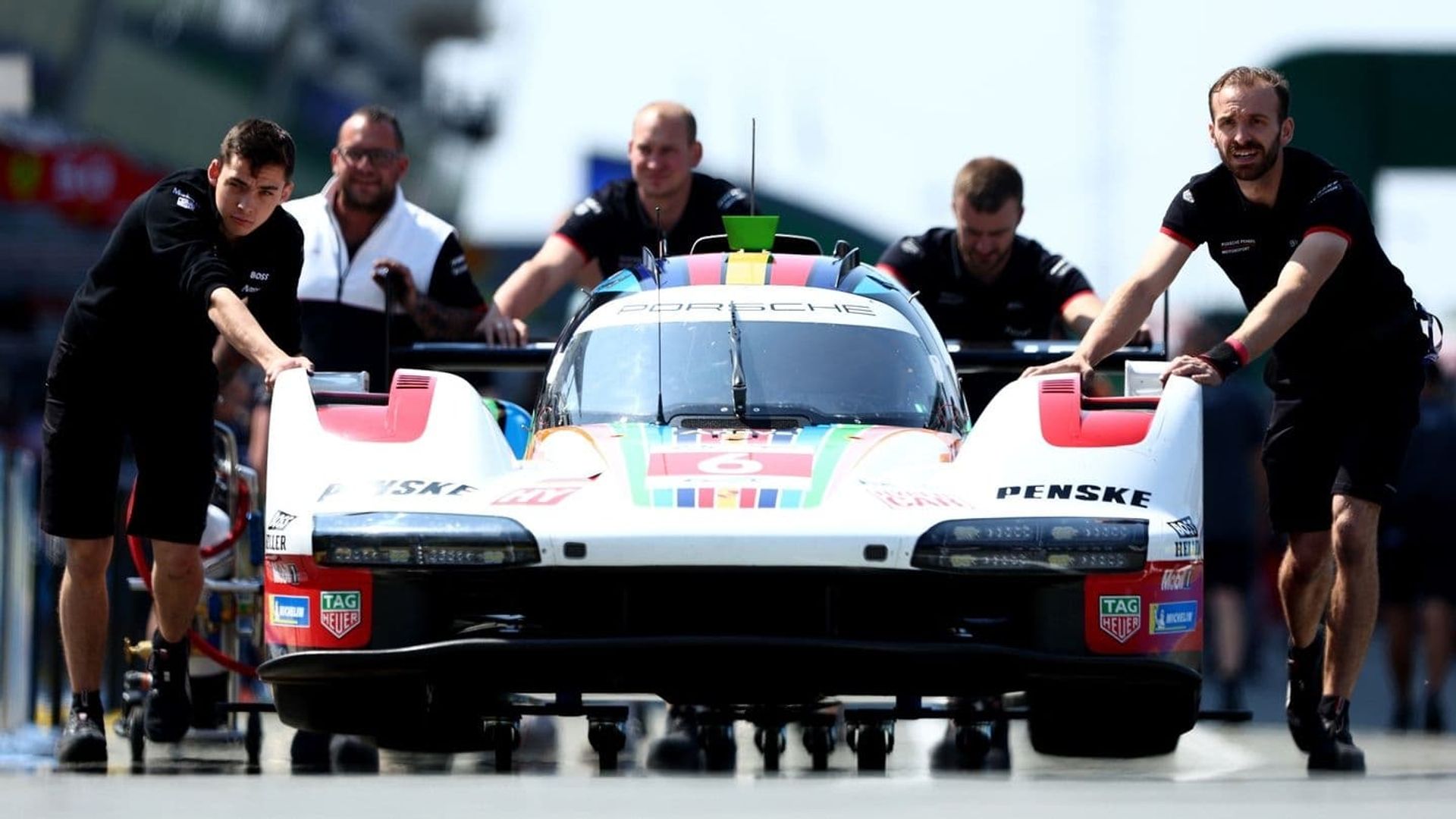 Racing with Giants: Porsche at Le Mans background