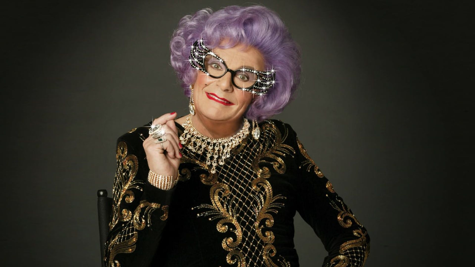 The Dame Edna Treatment background