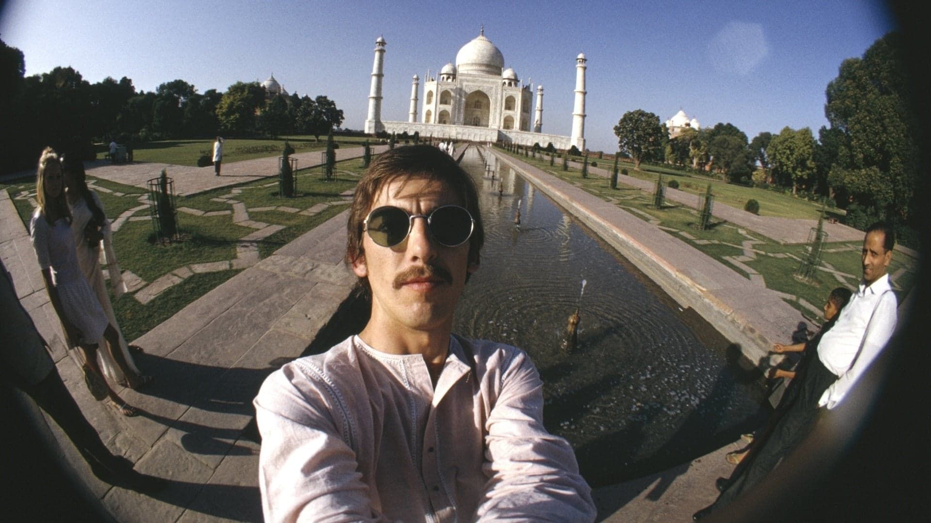 George Harrison: Living in the Material World background