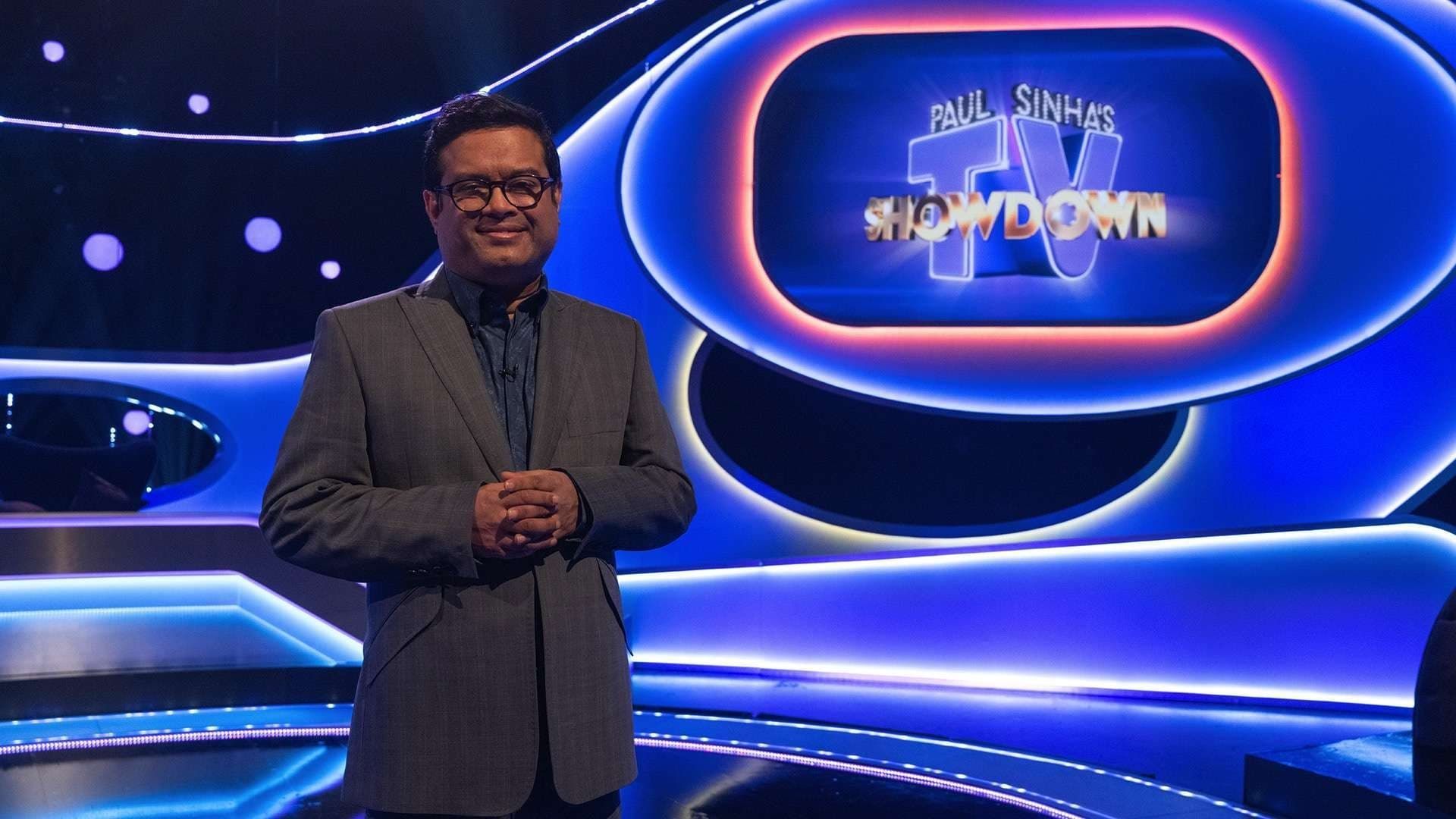 Paul Sinha's TV Showdown background