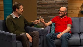 Episode 4 David Cross Wears a Red Polo Shirt & Brown Shoes with Red Laces