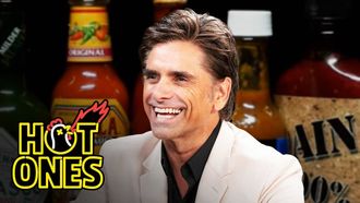 Episode 10 John Stamos Falls Out of His Chair While Eating Spicy Wings