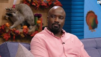 Episode 18 Mike Colter Wears a Pink Button Up and Black Boots