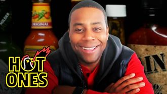 Episode 5 Kenan Thompson Becomes a Card-Carrying Spiceman While Eating Spicy Wings